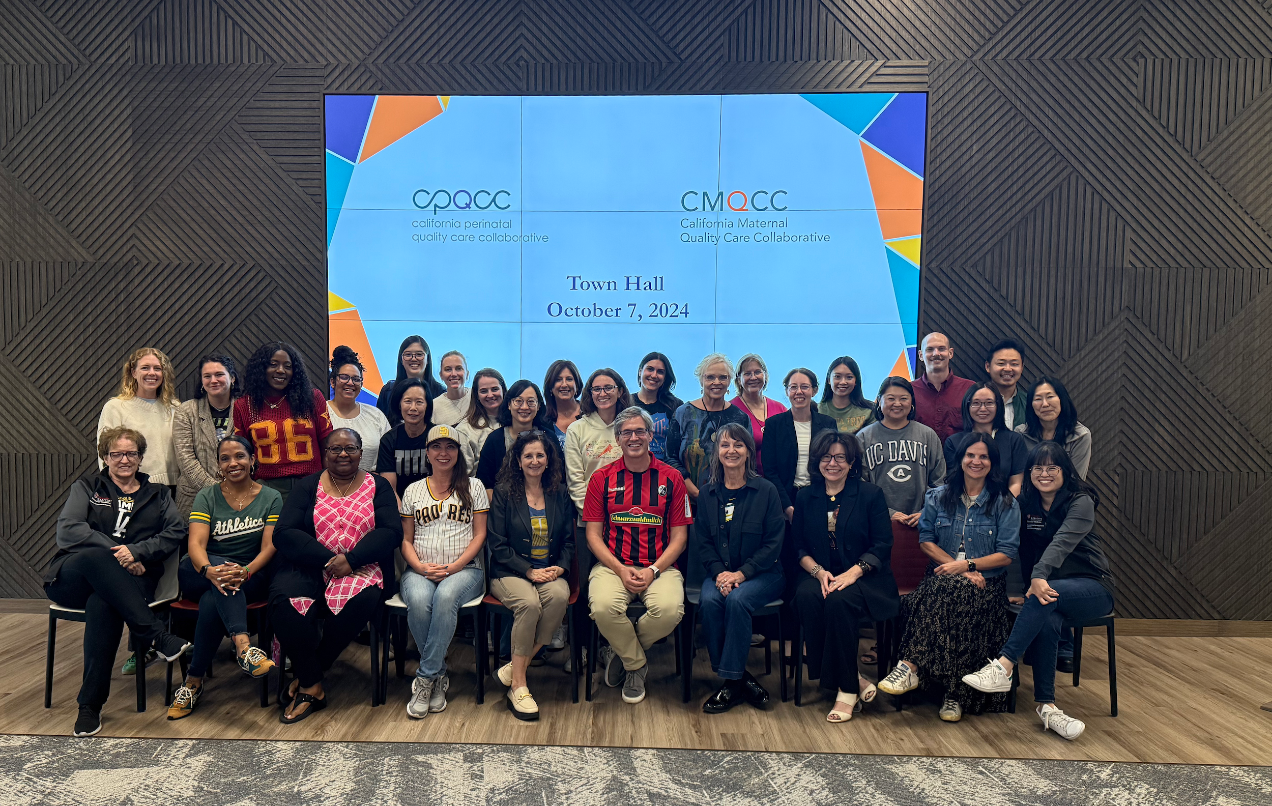 Photo of CPQCC staff members gathered together for a team event