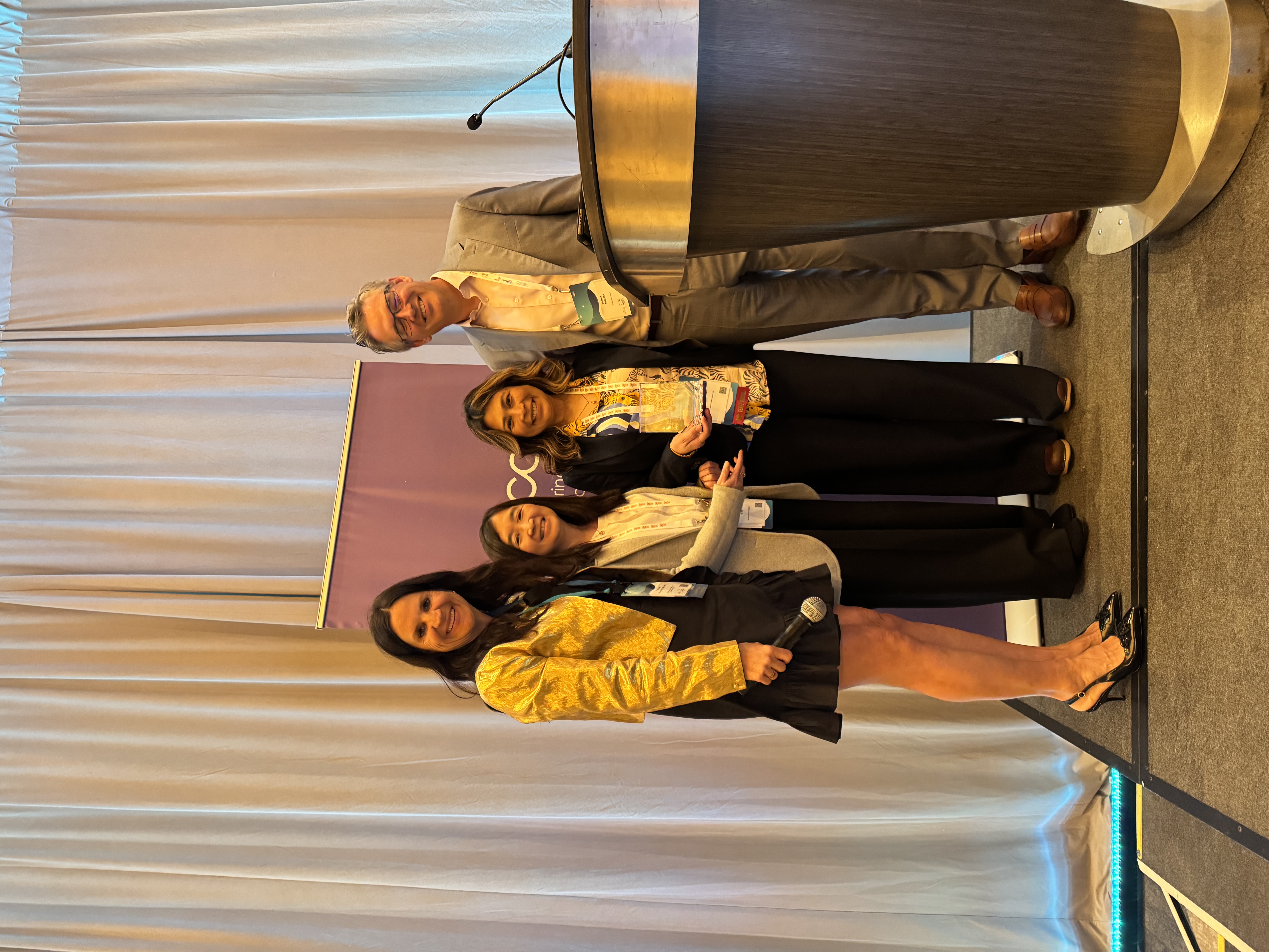 Shilu Ramchand and Liezl Uy receiving the Pettit Award